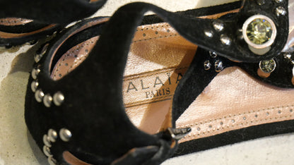 Alaïa metallic gladiator sandals black